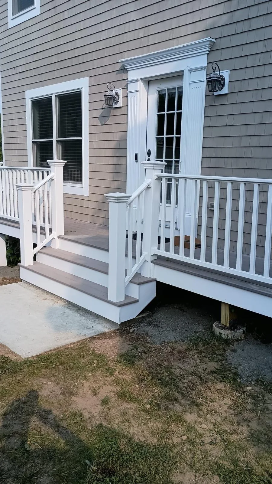 Completed white exterior stairs and railings